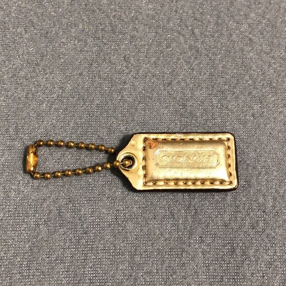 1.5" VINTAGE COACH Gold Metallic Leather Nickel Fob Bag Charm Keychain Hang Tag - Picture 1 of 5